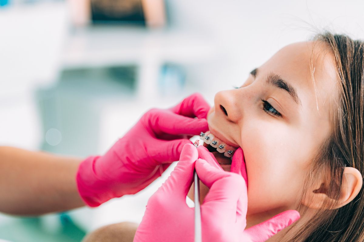 Featured image for “How to Help Your Child Floss with Braces On”